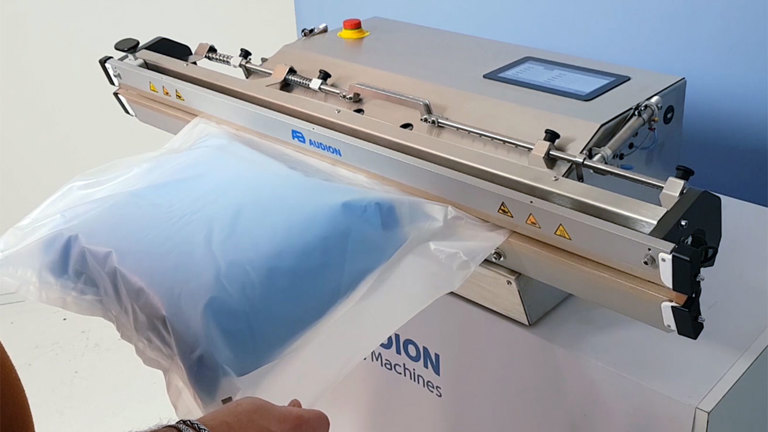 Audion Wrapping Machine Packing vaccine syringes | Audion Elektro
